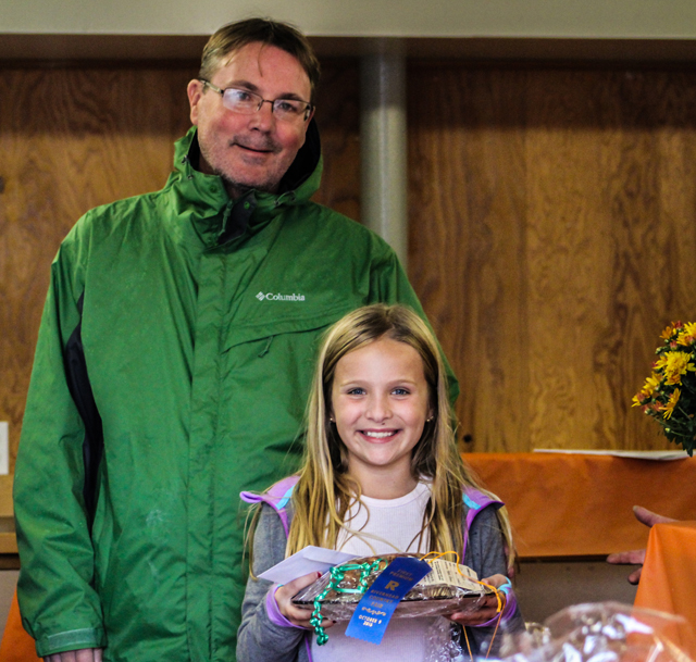 Alexandra Hoverkamp, pictured here with her father Douglas Hoverkamp, won an award for her apple bread.