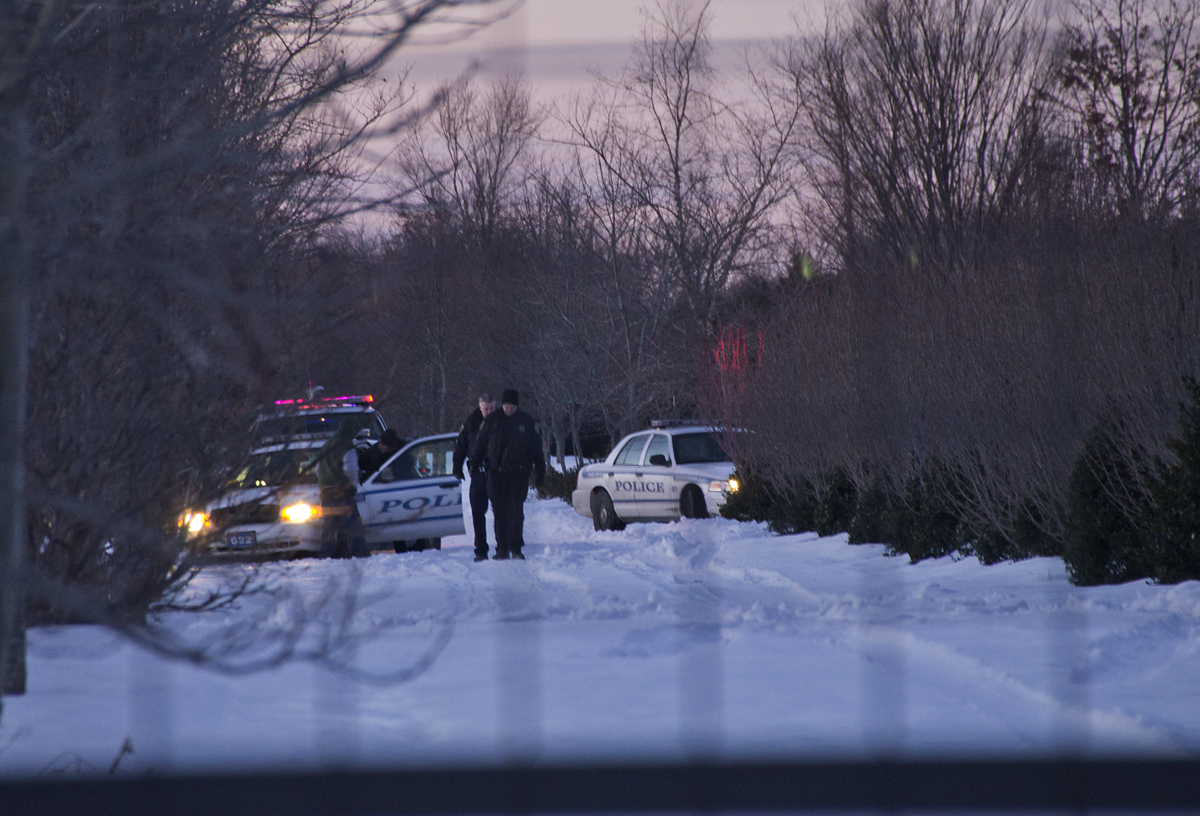 Riverhead police investigate at an Aquebogue nursery Friday evening. (Credit: Paul Squire)