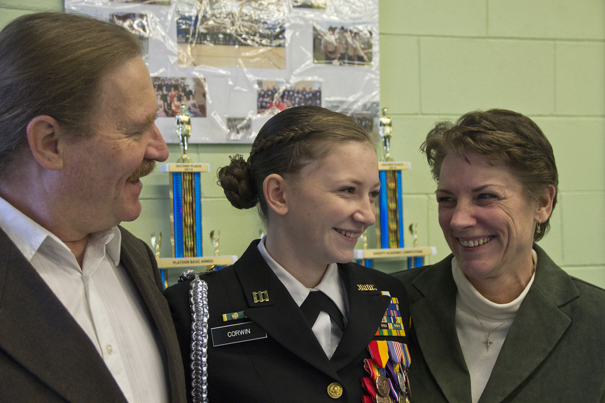 RHS senior and NJROTC cadet Brianne Corwin (center) with her parents, Todd and Mary Anne Corwin. (credit: Paul Squire)