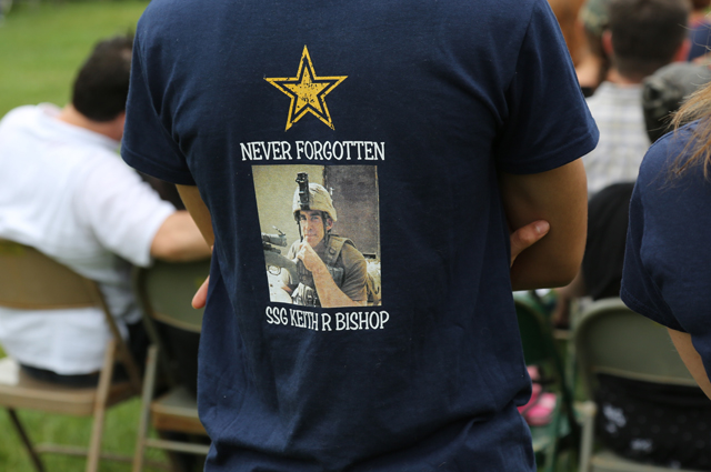 Many folks wore shirts honoring individuals or specific branches of the military. (Credit: Grant Parpan)