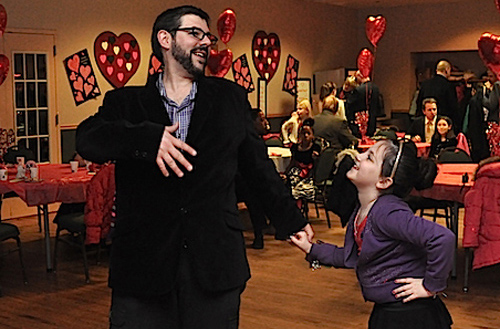 Adam Intravia and his daughter Erin, 8, dance their hearts out. (Cyndi Murray photo) 