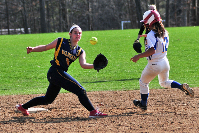 Shoreham-Wading River shortstop Alex Hutchins fields the ball as the Comsewogue runner takes second. (Credit: Bill Landon)