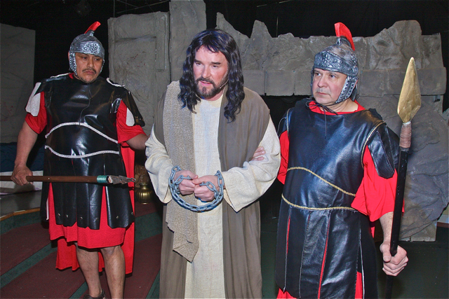 John Dillon (center) as Jesus and the Roman guards Mario Sequen (left) and Roger Roldan. (Credit: Barbaraellen Koch)