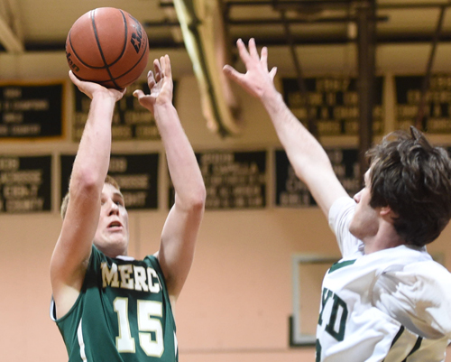 Mike Chiliki of Bishop McGann-Mercy putting up a successful jump shot against William Floyd in the first round of the Colonial Classic. (Credit: Robert O'Rourk)