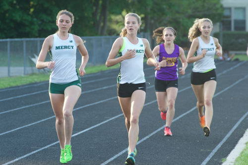 Bishop McGann-Mercy's Kaitlyn Butterfield, far left, and Meg Tuthill led the way during the 1,500-meter race. (Credit: Robert O'Rourk)