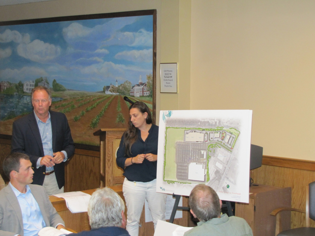 Bill Greimel of Brixmor and counsultant Courtney Riley discuss their new plans for the Costco shopping center Thursday.