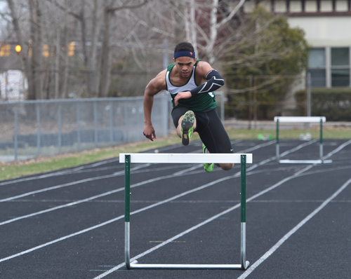 McGann-Mercy senior Luis Cintron won four events in a dual meet against Ross Monday, including the 400-hurdles. (Credit: Robert O'Rourk)