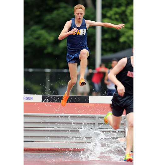 Keith Steinbrecher of Shoreham-Wading River competes in the steeplechase. (Credit: Daniel De Mato)