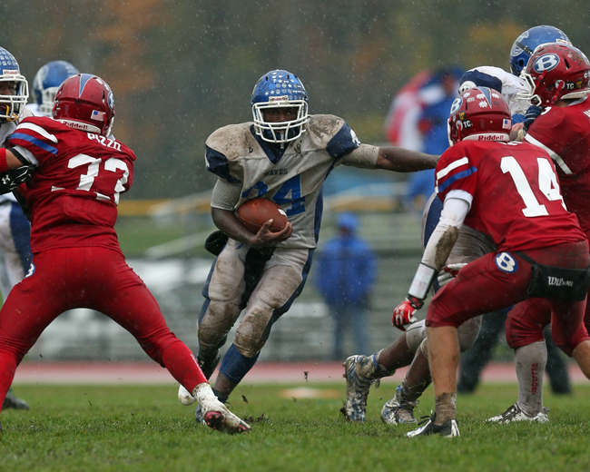 Riverhead's Raheem Brown rushes up the middle for a first down. (Credit: Daniel De Mato)