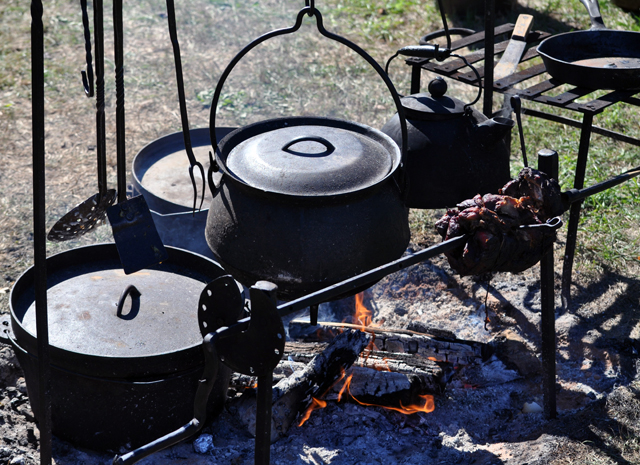 Cooking up a meal on the outskirts of camp. (Credit: Grant Parpan)