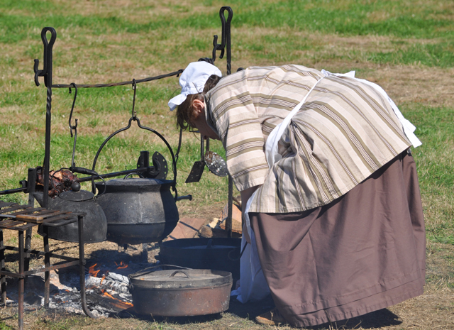 Cooking up a meal on the outskirts of camp. (Credit: Grant Parpan)
