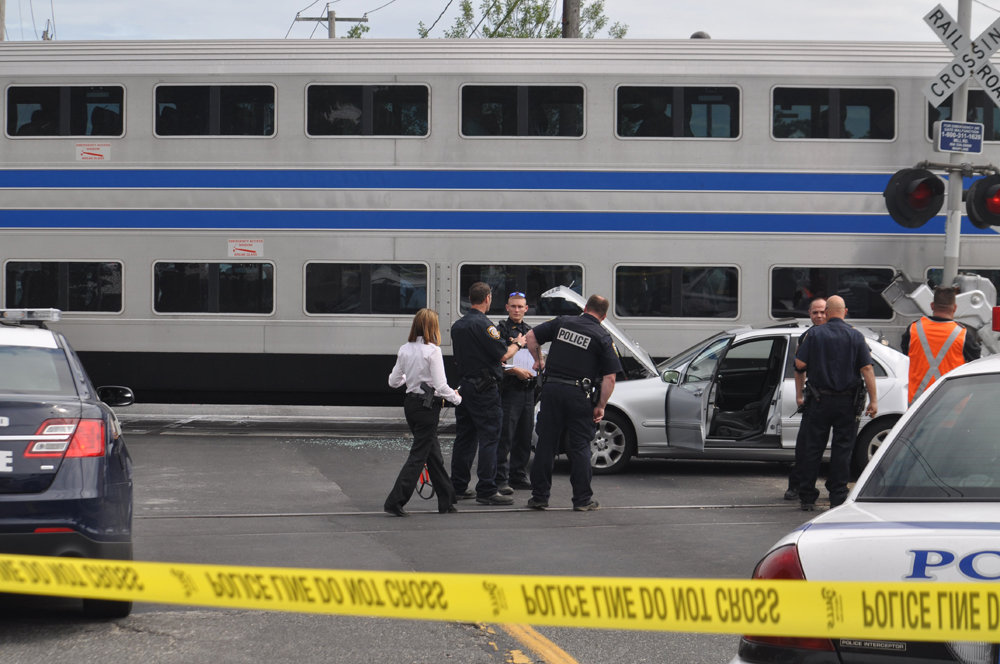 Investigators on the scene of Thursday's train crash in Riverhead. (Credit: Joe Werkmeister)