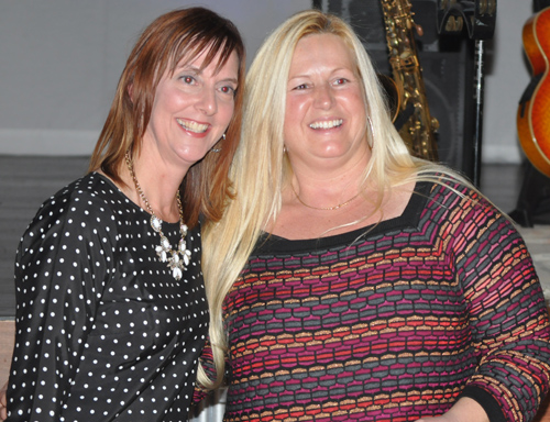 GRANT PARPAN PHOTO | Denise Lucas of Move the Animal Shelter, right, with award presenter Angie Reese.