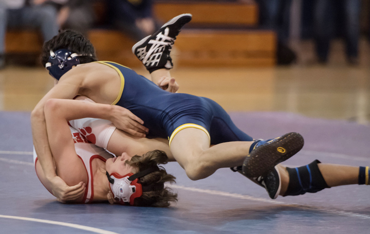 Dylan Meloni pins his opponent. (Credit: Robert O'Rourk)