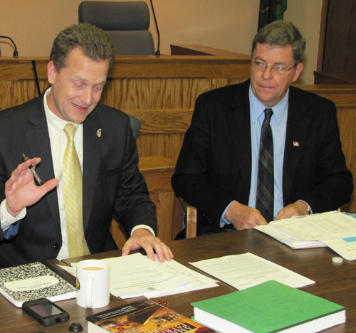 TIM GANNON FILE PHOTO | Supevisor Sean Walter (left) and Councilman George Gabrielsen during a recent Town Board meeting.