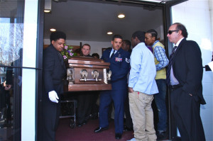 BARBARAELLEN KOCH FILE PHOTO  |  Pallbearers carrying the casket out the Demitri Hampton funeral at Galilee Church of God in Christ last month.
