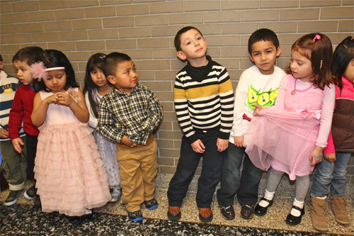 BARBARALLEN KOCH PHOTO  |  The Southampton Head Start 3- and 4-year olds waited nervously in the hall outside Riverhead High School's auditorium for the show to start Friday evening.