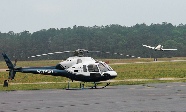 A helicopter at East Hampton Airport last year. (Credit: Kyril Bromley/The East Hampton Press)
