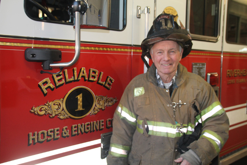 (Photo by Paul Squire) Norman "Skip" Beal stands in front of his Reliable Engine No. 1