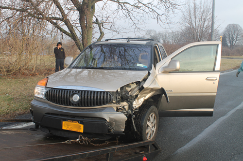 PAUL SQUIRE PHOTO | One person suffered minor injuries in a two-car crash on Route 105 Wednesday morning.