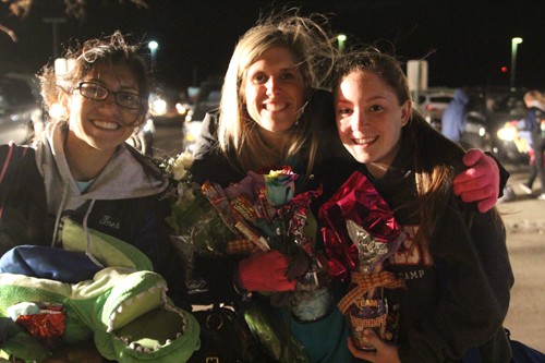 Coach Stephanie Piraino, center, with Kaitlyn Berry (right) and Ines Garcia.