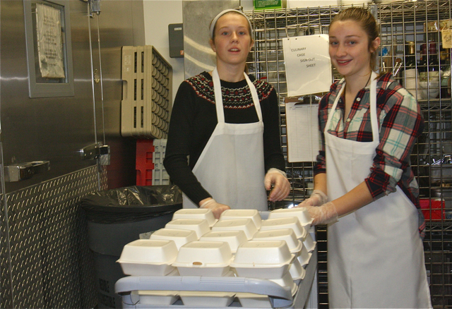 Westhampton Beach High School sophomores Reilly Gwinn and Bronte Merrell volunteered in the kitchen. (Credit: Barbaraellen Koch)