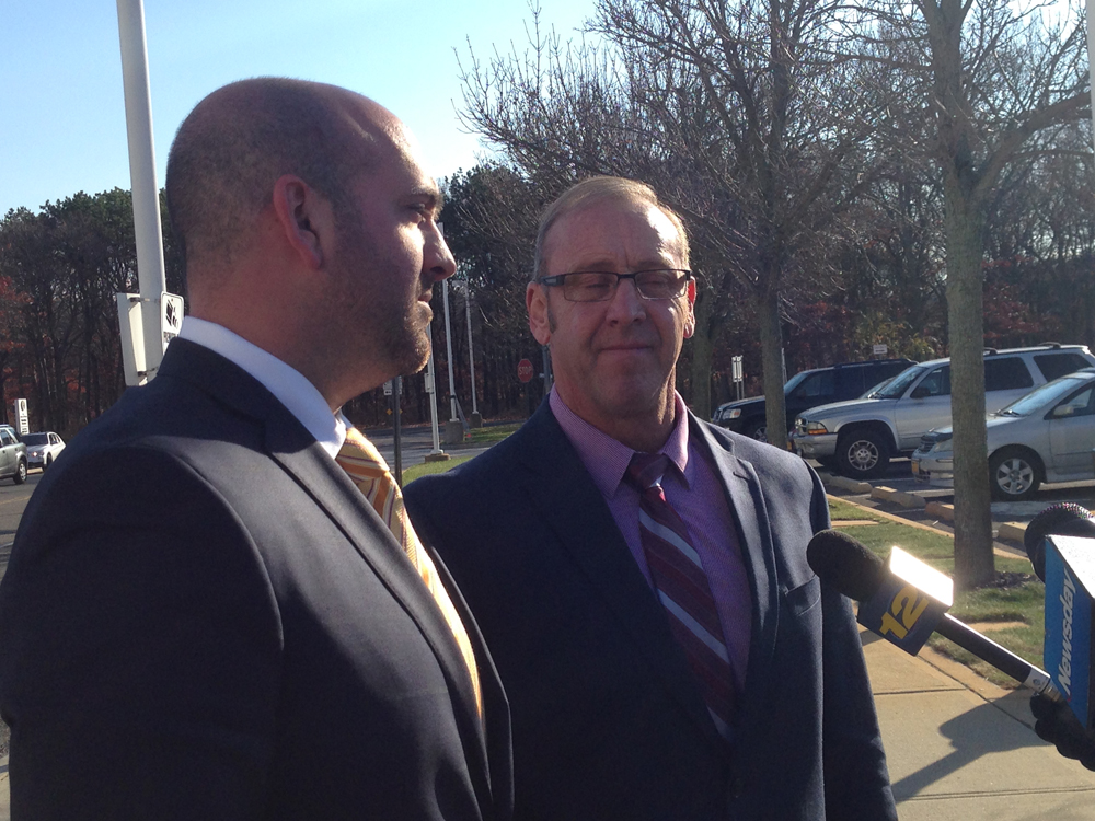 Former Southampton Town Councilman Brade Bender with his Brian DeSessa outside federal court in Central Islip Tuesday. 