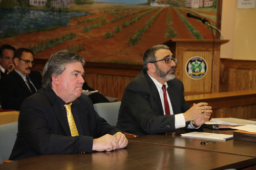 PAUL SQUIRE PHOTO | Attorney Vincent Messina (right) speaks to the Riverhead ZBA with researcher 