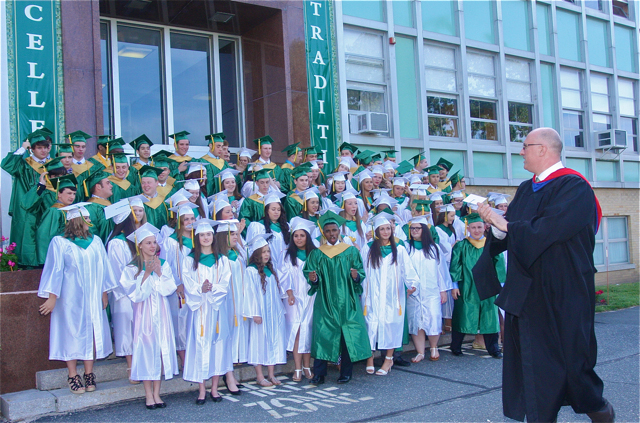 Principal Carl Semmier applauds the Class of 2015. (Credit: Barbaraellen Koch)