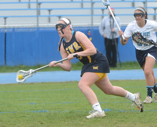Jess Angerman led Shoreham-Wading River into the county finals last year. Now she's excelling at the University of Michigan. (Credit: Robert O'Rourk)