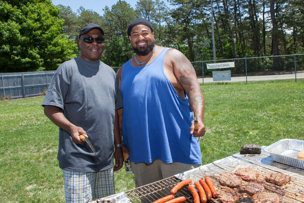 Larry Williams and Bob Brown man the grill.
