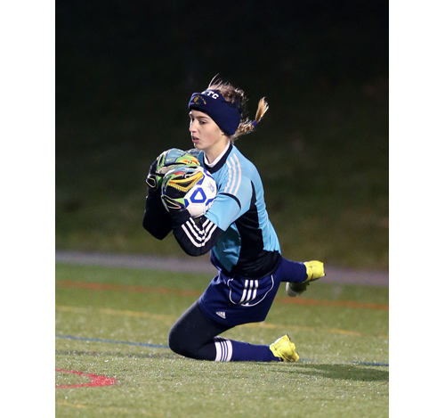 Shoreham goalkeeper Lydia Kessel makes a save in the first half against South Side. (Credit: Daniel De Mato)
