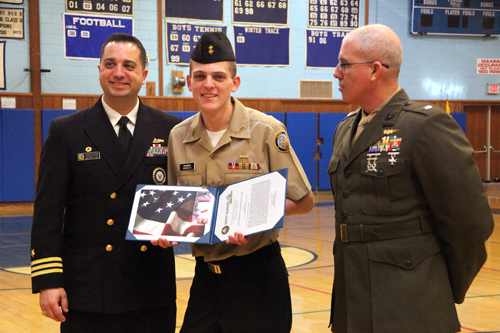 COURTESY PHOTO | Navy Officer Commander John Karin presents Cadet Anthony Mammina with the Meritorious Merit Award as Lt. Col. Peter McCarthy looks on.