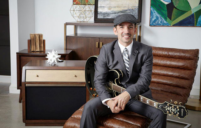 Riverhead jazz guitarist Matt Marshak with some of the pieces he helped inspire for Rhythm & Home, a new furniture line. (Courtesy photo)