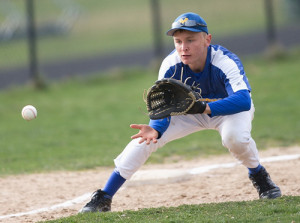 GARRET MEADE PHOTO | Mattituck third baseman Will Gildersleeve focuses on fielding a ground ball.