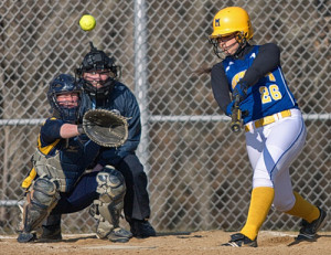 GARRET MEADE PHOTO | Brittany Tumulty of Mattituck making contact on a pitch from Shoreham-Wading River's Chelsea Hawks.