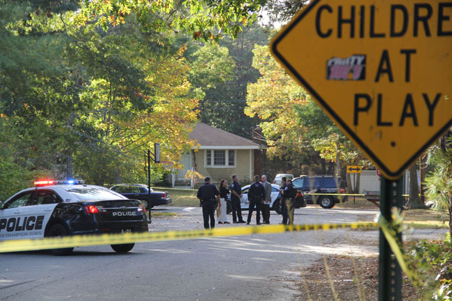 Police investigate the scene of an shooting on McKinley Street in Flanders Wednesday afternoon. (Credit: Carrie Miller)