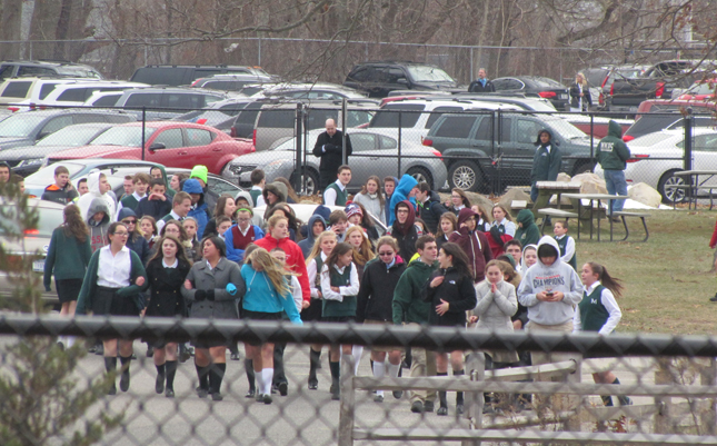 Students are evacuated from McGann-Mercy High School Wednesday afternoon. (Credit: Tim Gannon)