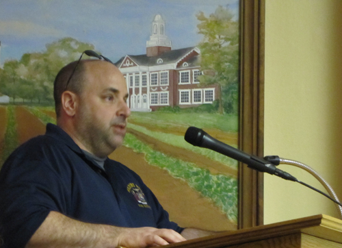 Mike Harrigan, chairman of the Wading River Fire District commissioners, speaks at Tuesday's town board meeting. (Credit: Tim Gannon)