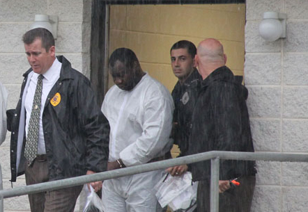 Kwame Opoku, 32, of Mastic Beach, being led to his arraignment on Oct. 16. (Credit: Carrie Miller, file)