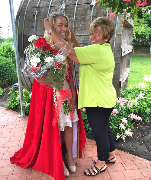 Claudia Zacharewicz of Jamesport is crowned Polish Town Queen by event co-chair Marianne Trubish Saturday. (Credit: Rachel Young)