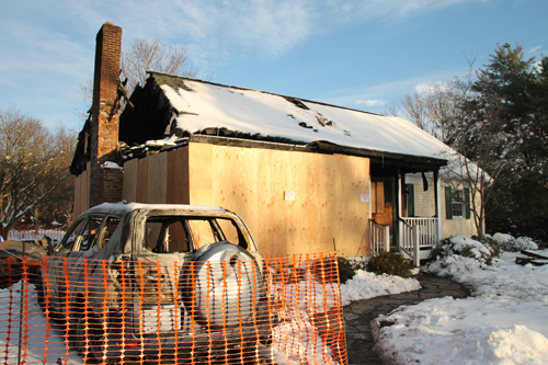 The remains of the Dalecki family home in Wading River in the days following a February 2014 fire. (Credit: Paul Squire, file)