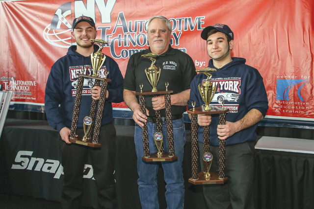 Evan Wagner (from left), teacher Mike O'Hara and John DeLuca with their first-place trophies Feb. 14 at the state competition. (Credit: courtesy photo)