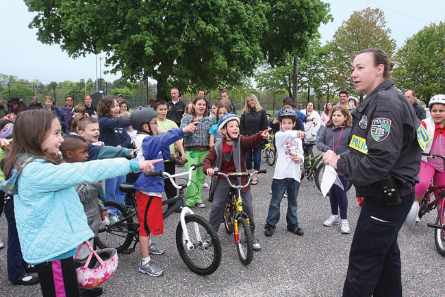 Sgt. Kubetz pictured in 2012 at the Police Athletic League's annual Bike Rodeo at Stotzky Park. (Credit: Barbaraellen Koch, file)
