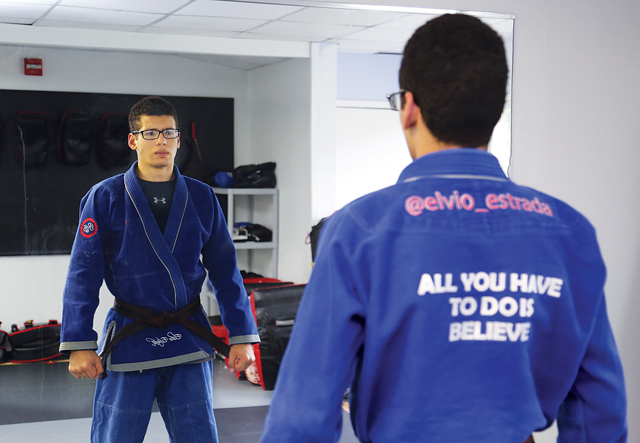 I loved this portrait of Riverhead High School junior Elvio Estrada, 17, who competed in the world Brazilian jiu-jitsu competition in June. The view from behind, featuring his motto, says it all. (Credit: Paul Squire)