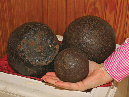 Cannonballs recovered from the skirmish are on display at Hallockville Museum Farm. (Credit: Barbaraellen Koch)