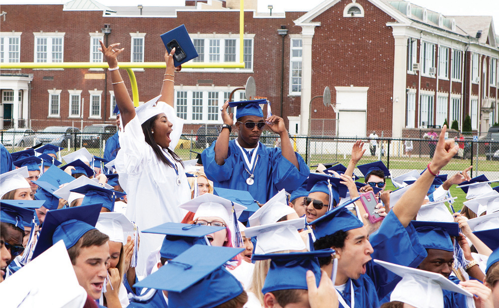 Students at the Riverhead High School graduation. (Credit: Katharine Schroeder)