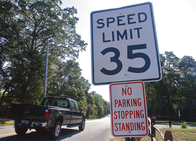 A speed limit sign on Middle Road. (Credit: Barbaraellen Koch)