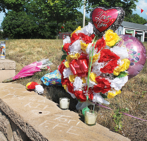 Friends set up a memorial on Route 58 for hit-and-run victim Kristina Tfelt a few days after her death. (Credit: Paul Squire, file)