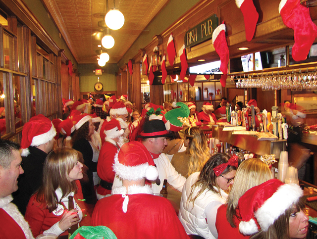 When but during Santa Con will you find a room full of Santa Claus' at Digger O'Dell's in Riverhead? The event raised money for Brendan House. (Credit: Paul Squire)